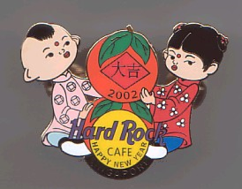 asian new year 2002 boy and girl holding 2 oranges pins and badges asian pins